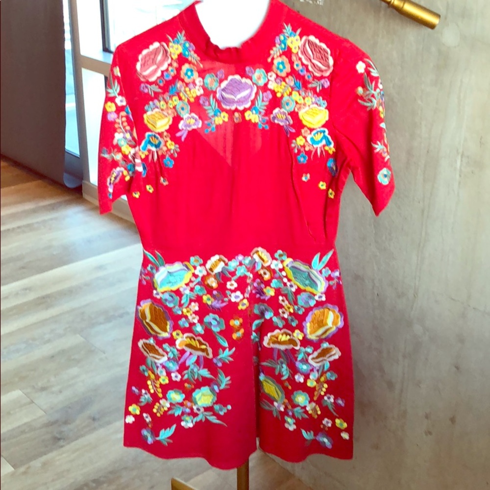 ASOS cotton red dress with colorful embroidery.